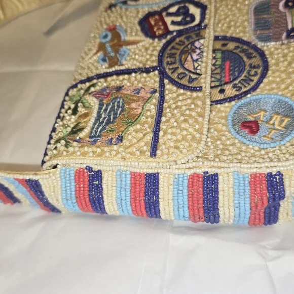 T.J.Maxx Beaded Beige Shoulder Bag with Colorful Travel Patches - Picture 2 of 4